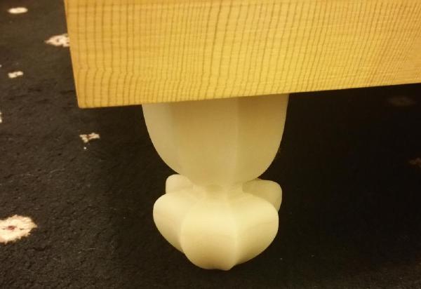 One of my first projects: 3D-printing four goban (board to play Go game) legs. They look almost like real ivory. It's not just plastic — there's an aluminium core inside for stability and longevity.