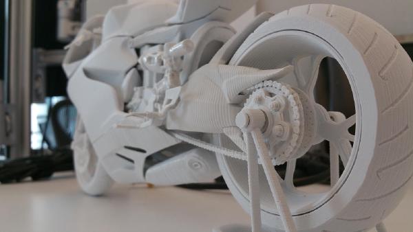Early 3D print of a motorcycle, consisting of over 40 detailed parts. I had a tight schedule, so for a week I slept near my first 3D printer to make sure all the parts would be ready in time.