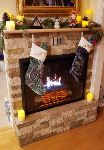 The fireplace project was quite complex: it's a modification of a cheap fireplace by adding an OLED screen connected to a Raspberry Pi and rendering a dynamic UE5 Niagara fluids fire simulation from your workstation into a stream via WiFi onto a thin RPi client. That's one fun way of how you can get a nice and cozy spot for your Christmas stockings :)